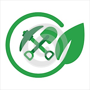 Good mining practice green eco environmental friendly pickaxe and shovel with leaf icon symbol excavation construction
