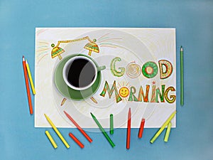 Good morning coffee and alarm clock concept. Cup of coffee with hand drawn alarm clock