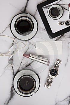 Good morning coffee with woman accessories with marble table top on a lazy sunday