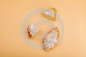 Good morning concept. Fresh croissants with cream filling and almond flakes. Sweet dessert