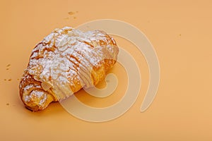 Good morning concept. Fresh croissants with cream filling and almond flakes. Sweet dessert