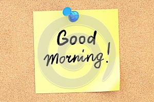 Good morning! Text on a sticky note pinned to a corkboard. 3D re