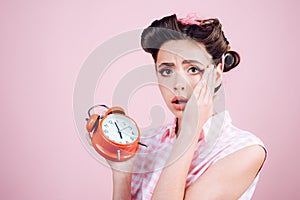 Good morning. time management. pinup girl with fashion hair. retro woman with alarm clock. Time. pin up woman with