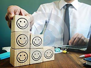 Good rating in the Customer satisfaction and evaluation concept. Businessman and cubes