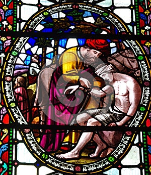 The Good Samaritan in stained glass