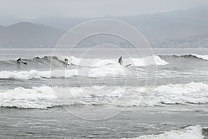 Good surfing day at Morro Rock Beach, California