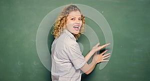 Good teacher master of simplification. Teaching could be more fun. Woman teacher in front of chalkboard. Teacher explain photo