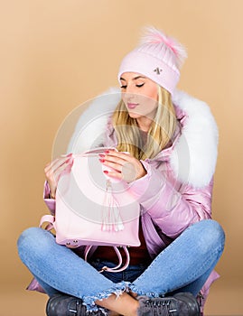 Good time. happy winter holidays. warm winter clothing. shopping. girl in puffed coat. faux fur fashion. flu and cold