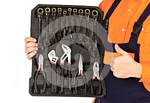 Really good tools. Handyman concept. Professional equipment. Toolbox talk. Mechanic Tool Box. Man in uniform carries