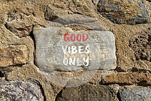 Good vibes only symbol. Concept word Good vibes only on beautiful big stone. Stone wall. Beautiful stone wall background. Business