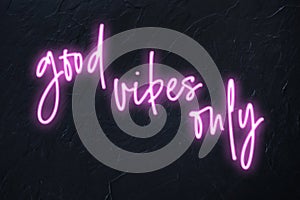 Good vibes only written in pink neon style on black background