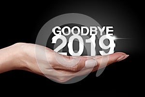 Goodbye 2019 with hand