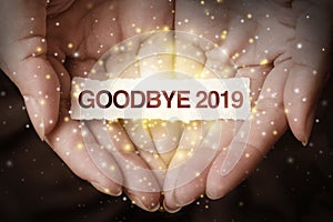 Goodbye 2019 with hand