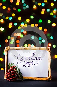 Goodbye 2019 New Year note with colorful background