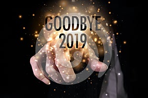 Goodbye 2019 with hand