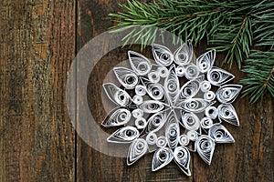 Goodly snowflake in quilling techniques for Christmas decoration
