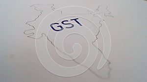 Goods And Services Tax on an India map outline on a plain white background