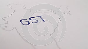 Goods And Services Tax on an India map outline on a plain white background