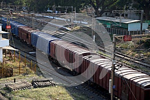 goods train passing from railway station - Image