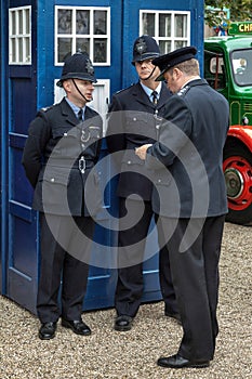 GOODWOOD, WEST SUSSEX/UK - SEPTEMBER 14 : Policemen outside an o