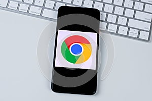 Google Chrome app logo on a smartphone screen.