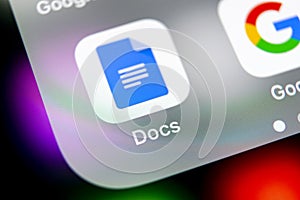 Google Docs icon on Apple iPhone X smartphone screen close-up. Google docs icon. Social network. Social media icon