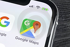 Google Maps application icon on Apple iPhone X screen close-up. Google Maps icon. Google maps application. Social media network