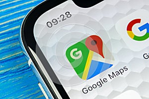 Google Maps application icon on Apple iPhone X screen close-up. Google Maps icon. Google maps application. Social media network