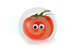 Googly eyes. Funny cute red mister Fresh Tomato, isolated on white background