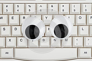 Googly eyes on a keyboard