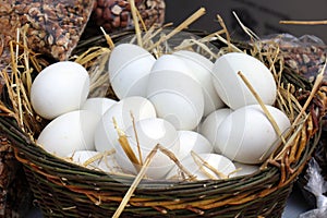 Goose eggs in wicker hamper