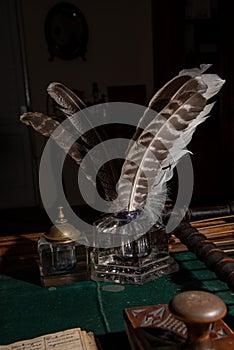 Goose quills for writing and an inkwell on the druggist`s table. Early 19th century