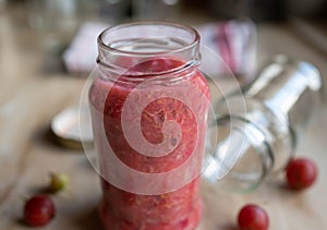 Gooseberry compote in a glass jar