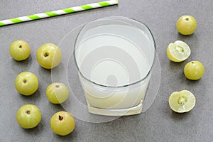 Gooseberry juice in a glass cup