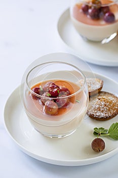 Gooseberry posset and almond cakes