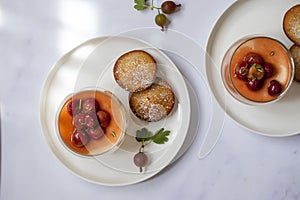 Gooseberry posset and almond cakes