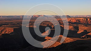 Goosenecks State Park and Monument Valley, view from Muley Point right after sunrise, USA