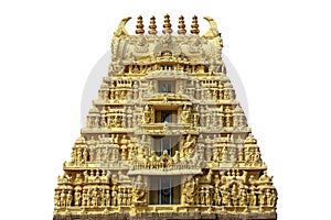 A Gopuram, or gopura, isolated on white background. It is a monumental entrance tower of an Hindu Temple. photo