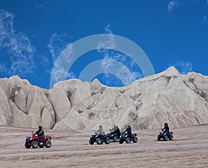 Tourists enjoying a quad bike ride in Cappadocia, Central Anatolia