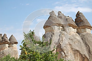 Goreme Valley (Cappadocia Turkey). Ancient Byzantine Christian churches hewn out of the rock. Fairy chimneys photo