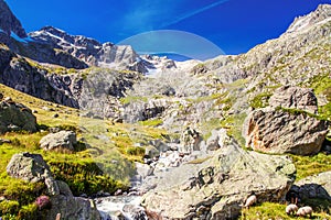 Gorezmettlenbach river with Swiss Alps Wandenhorn, Grassengrat and Chlo Spannort on Sustenpass, Switzerland, Europe