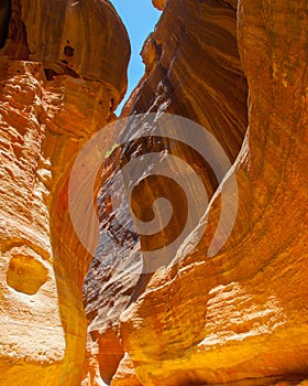 Gorge with rocks of red sandstone in Petra