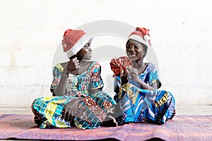 Gorgeous African Christmas Children Wearing Hats and Giving Presents