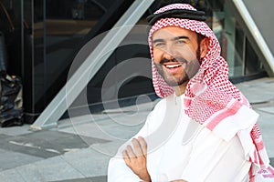 Gorgeous Arabic businessman smiling in office space