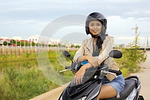 Gorgeous asian girl with motorcycle