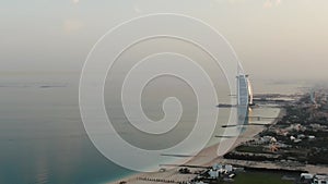 Gorgeous beach of Persian Gulf with Burj al Arab hotel on the horizon, 4k