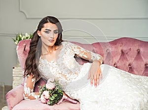 Gorgeous bride portrait. Beautiful bride with wedding makeup, dress