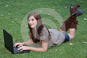 Gorgeous Brunette Lady and Laptop Computer