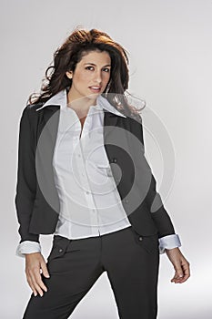 Gorgeous Brunette Model Poses In A Studio Environment Against A White Background