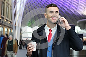 Gorgeous businessman calling from lobby